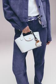 Folleto Longchamp Página 2