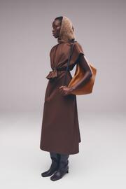 Folleto Longchamp Página 1