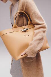 Folleto Longchamp Página 2