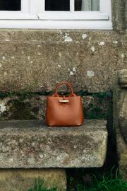 Folleto Longchamp Página 1