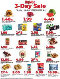 Hy-Vee weekly ad Page 1: Bush's baked or grillin' beans €1,98, Hy-Vee purified drinking water €1,99