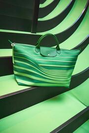 Folleto Longchamp Página 2