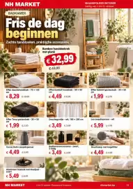 NH Market folder Pagina 11: Effen terry gastendoek €1,99, Douchegordijn €3,49
