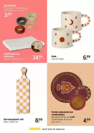 Xenos folder Pagina 64: Tafelkleed wit bloemen €34,99, Serveerplank ruit €8,99