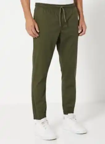 Noon Solid pattern premium joggers military green offer