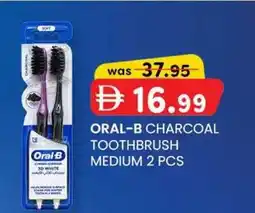 KM Trading Oral-B charcoal toothbrush medium offer
