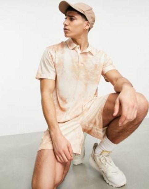 ASOS Reebok – summer retreat – poloshirt aus netzstoff mit beigem muster Angebot