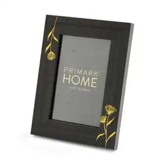 Schwarz-goldfarbener bilderrahmen mit blumendesign