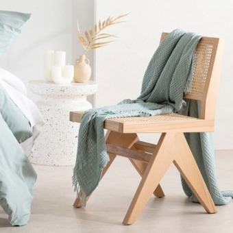 Pillow Talk Finch rattan dining chair by m.u.s.e. offer