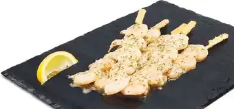 Woolworths Thawed imported garlic prawn skewers offer