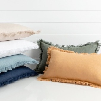Pillow Talk Sahara linen fringed feather oblong cushion by m.u.s.e. offer