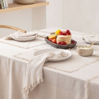 Pillow Talk Ashra fringed beige table linen by m.u.s.e. offer