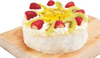 Woolworths Decorated Pavlova with Fresh Cream* offer