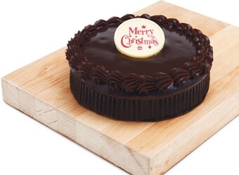 Woolworths Decorated chocolate mud cake* offer
