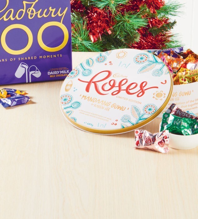 Cadbury roses tin 689g offer at Coles
