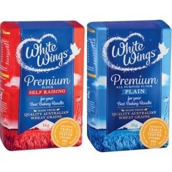 Coles White wings plain or self raising flour 1kg offer