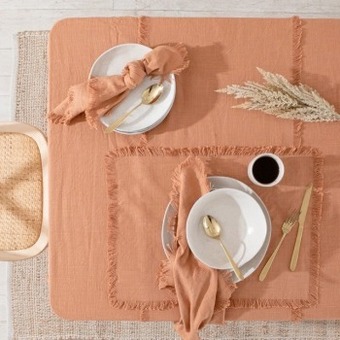 Pillow Talk Ashra fringed rust table linen range by m.u.s.e. offer