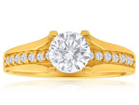 Shiels 9ct Yellow Gold Round Cubic Zirconia 4 Claw and Channel Set Ring offer