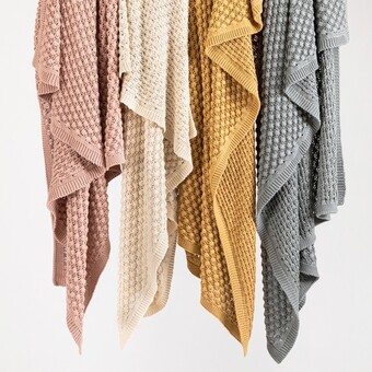Pillow Talk Popcorn throw by m.u.s.e. offer