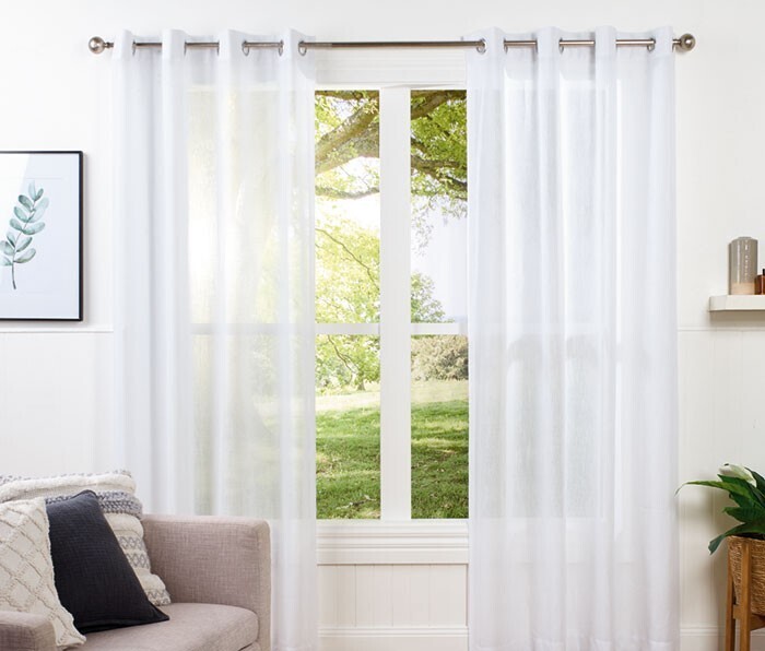 Meeko sheer eyelet curtains offer at Spotlight