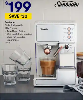 Cafe barista with milk frother