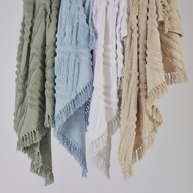 Malvinas tufted throw by habitat offer at Pillow Talk