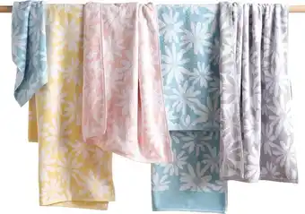 Koo daisy jacquard towel range
