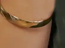 Angus & Coote 9ct gold 65mm solid bangle offer