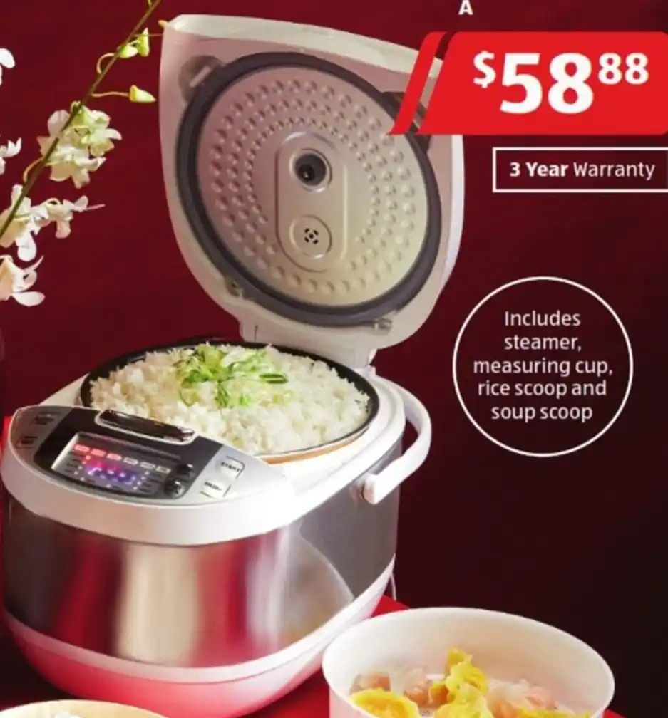 Digital Rice Cooker Includes steamer, measuring cup, rice scoop and