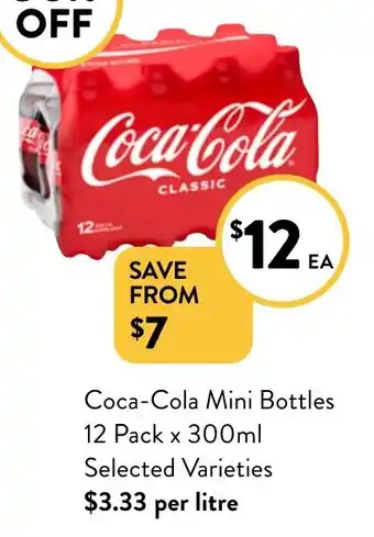 Foodworks Coca Cola Mini Bottles 12 Pack x 300ml offer