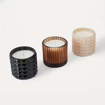 Kmart 3 pack midnight jungle fragrant candles offer