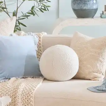 Pillow Talk Ava Boucle Ball Cushion by M.U.S.E offer