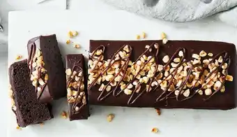 Woolworths Plantitude Vegan Chocolate Hazelnut Mud Cake 1 kg offer