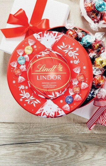 Coles Lindt Lindor Limited Edition Round Tin 433g offer