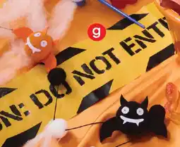 Coles Caution Tape Spider Web offer