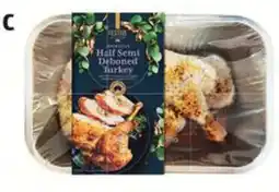 ALDI Fresh Half Semi Deboned Turkey with Cranberry, Pistachio and Sage Stuffing, Spiced Herb Seasoning and Butter Disc offer