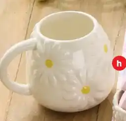 Coles Gingham table runner or novelty daisy mug offer