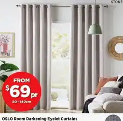 Spotlight Oslo room darkening eyelet curtains offer