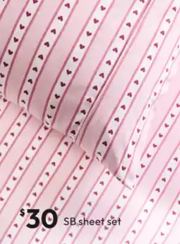 Target Target bedding set features a reversible quilt cover with a strawberry and heart pattern offer