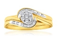 Shiels 9ct Yellow Gold 2 Ring Bridal Set with 0.15 Carats of Light Champagne Diamonds offer
