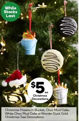 Woolworths Christmas Prawns in Bucket, Choc Mud Cake, White Choc Mud Cake or Wonder Duck Gold Christmas Tree Decorations offer