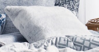 Woolworths Inspire Faux Fur Cushion offer