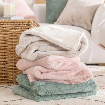 Pillow Talk Nevada Faux Fur Throw by M.U.S.E. offer