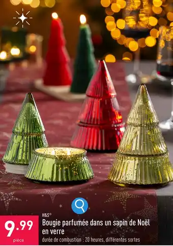 Bougie parfumée dans un sapin de Noël en verre