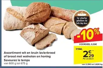 Carrefour Assortiment wit en bruin lavierbrood of brood met walnoten en honing Savourez le temps aanbieding