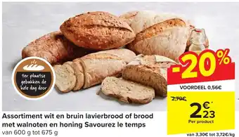 Carrefour Market Assortiment wit en bruin lavierbrood of brood met walnoten en honing Savourez le temps van 600 g tot 675 g aanbieding