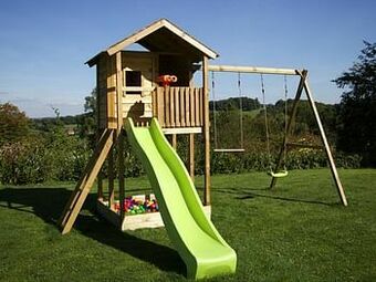 Dreamland BnB Wood schommel Lucas met zandbak en limegroene glijbaan aanbieding