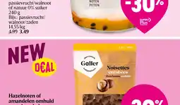 Delhaize Hazelnoten of amandelen omhuld met chocolade aanbieding