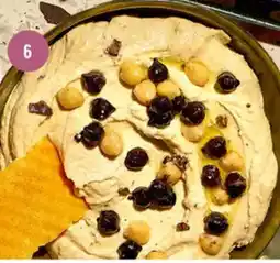 Delhaize Hummus met truffel aanbieding