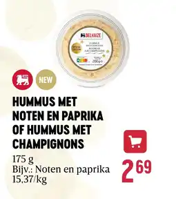 Delhaize HUMMUS MET NOTEN EN PAPRIKA OF HUMMUS MET CHAMPIGNONS aanbieding